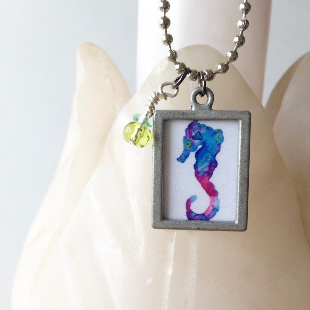 ocean-themed-jewelry-watercolor-seahorse-necklace-gift-under-25-by-mika-harmony